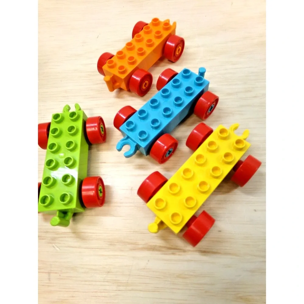 Large Legos Duplo Blocks 17 Pieces Wheels Car Chassis Boats and Airplanes